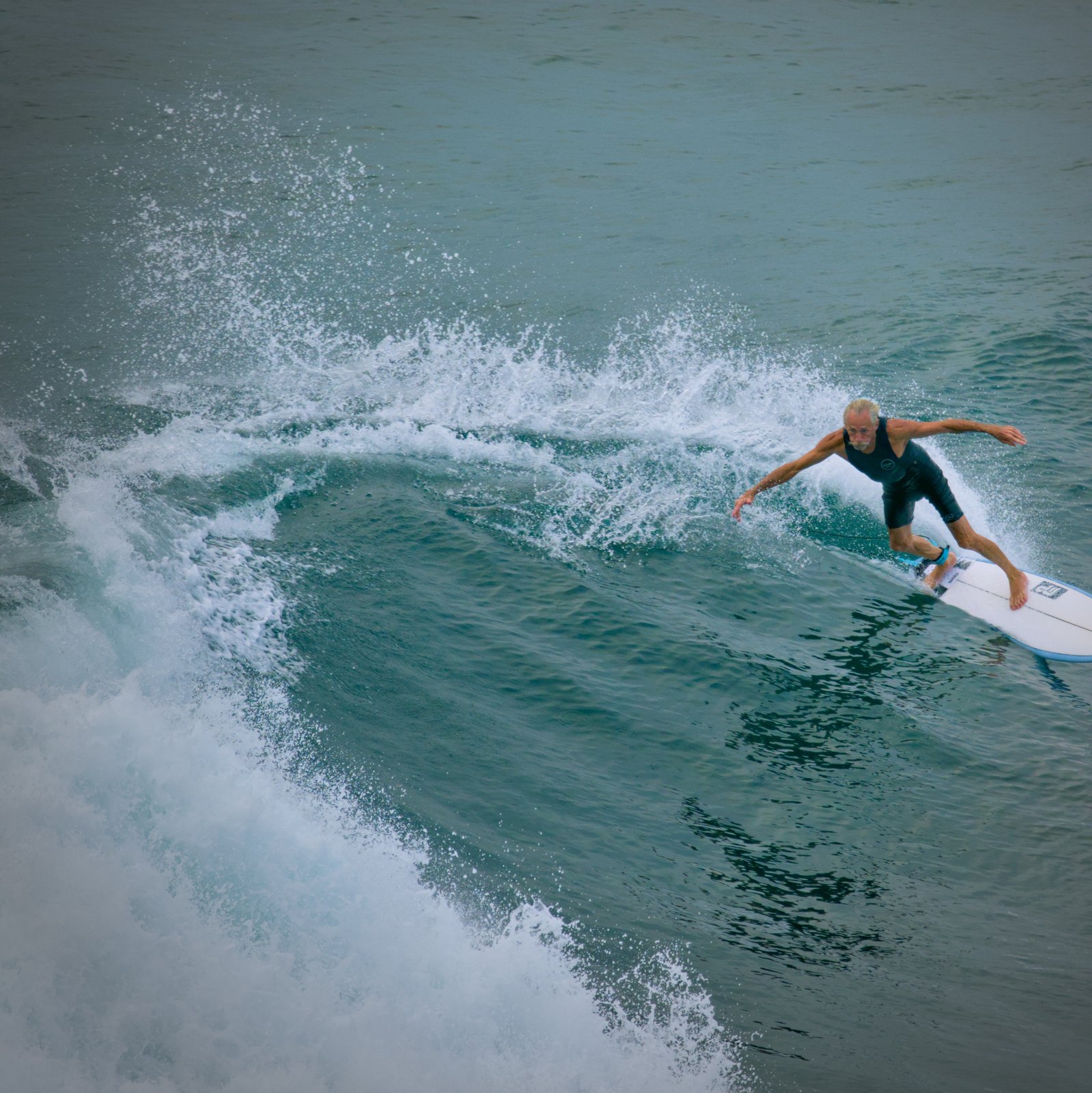 Surfer at Honolii