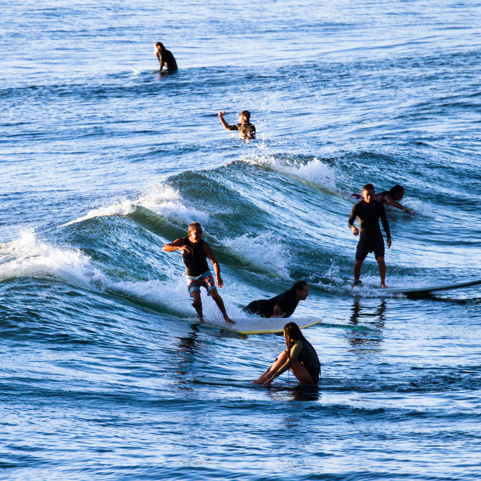 Surfers at Honolii